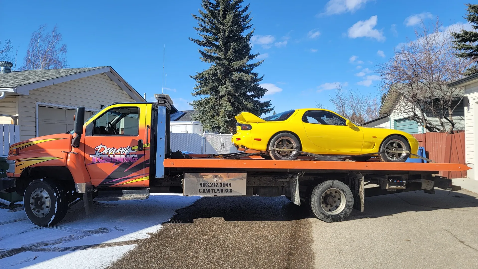 Sports car being transported by Dave's Towing