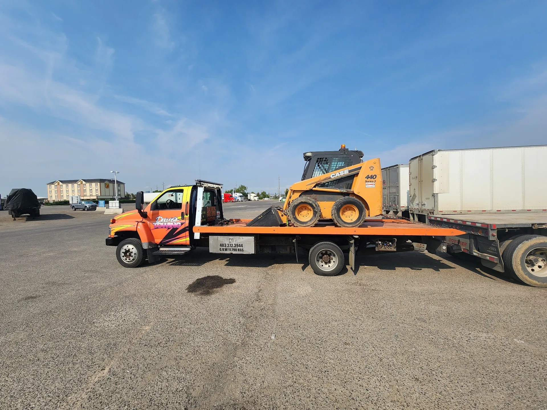 Equipment transport on Dave's Towing flatbed