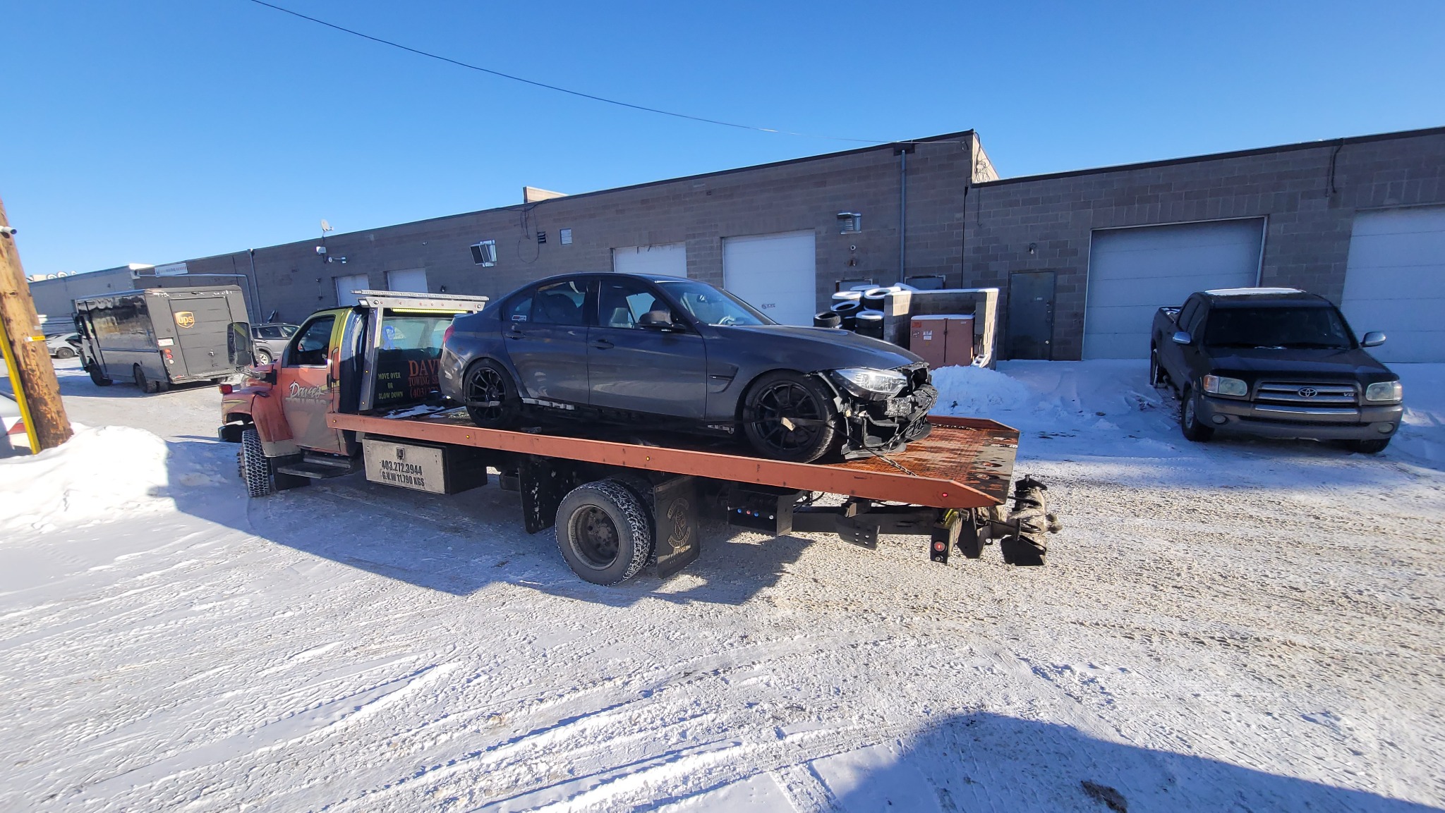 BMW M3 collision transport in winter – Calgary