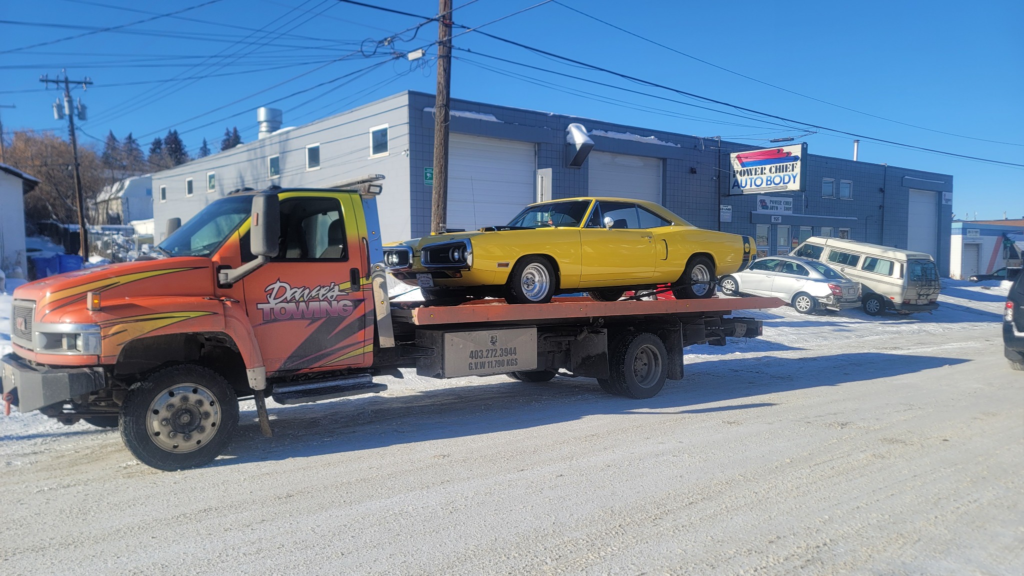 Yellow classic muscle car transport – front angle, Calgary