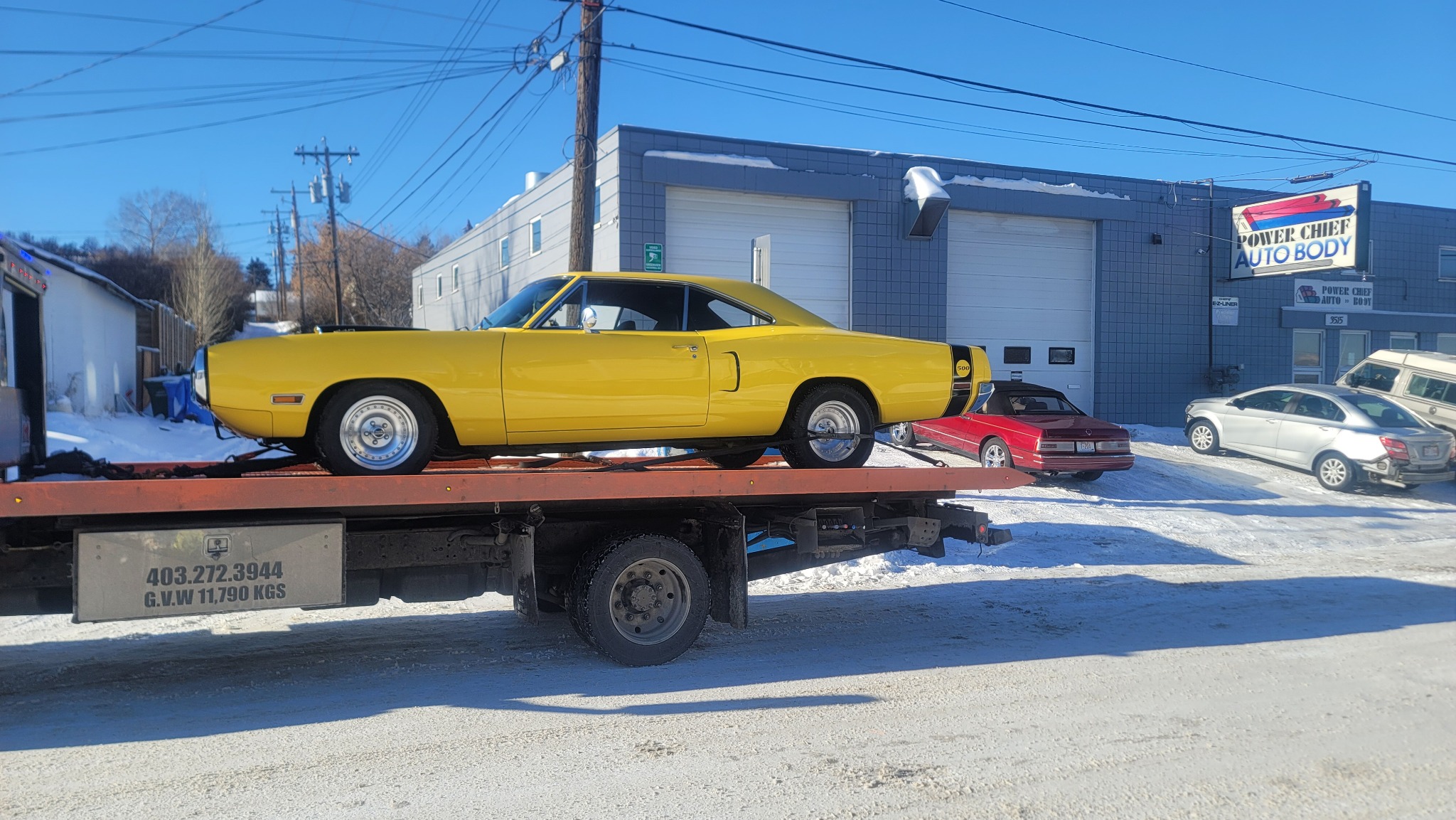 Yellow classic muscle car transport – side profile, Calgary