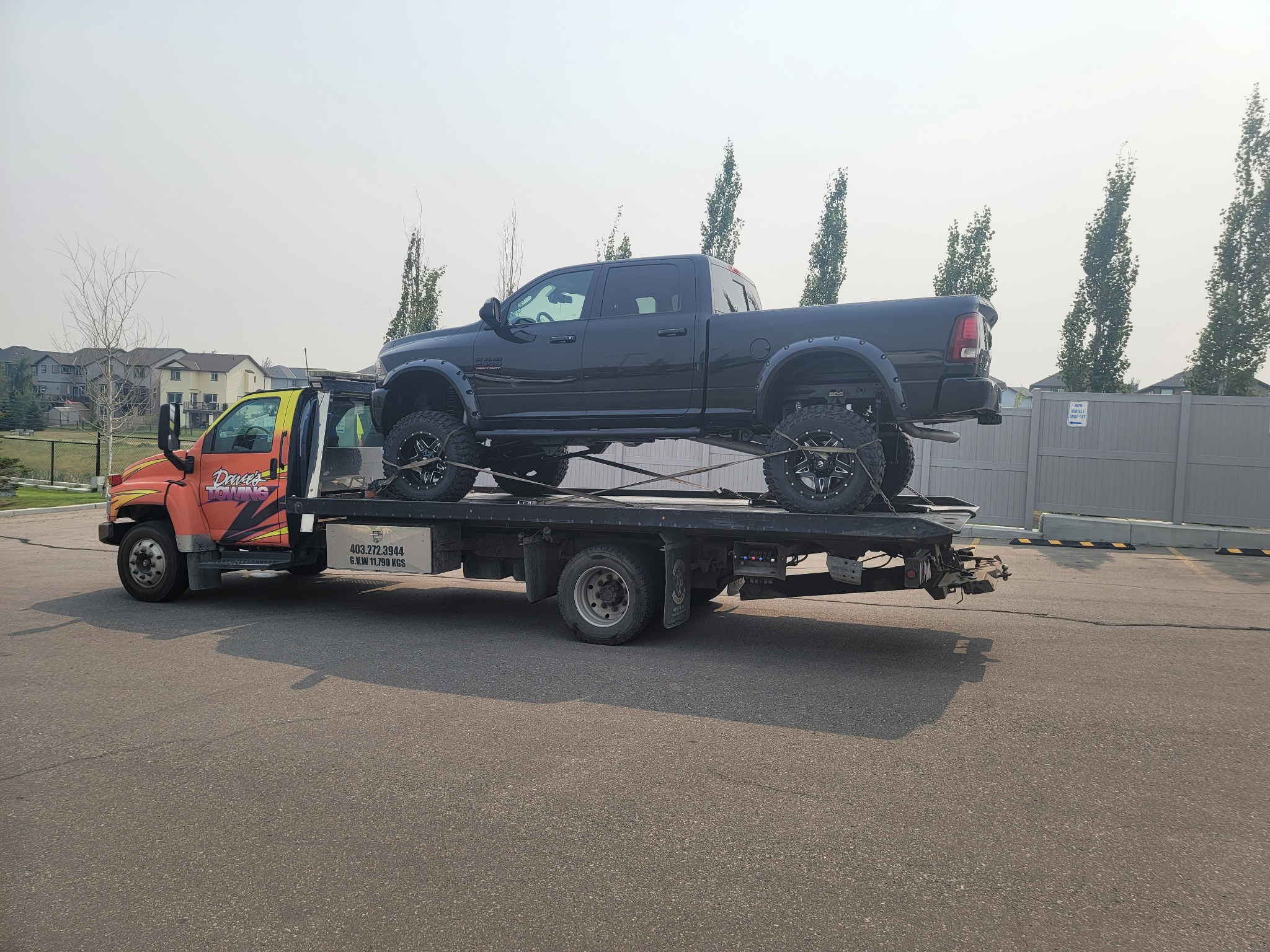 Lifted RAM pickup transported – Calgary SE