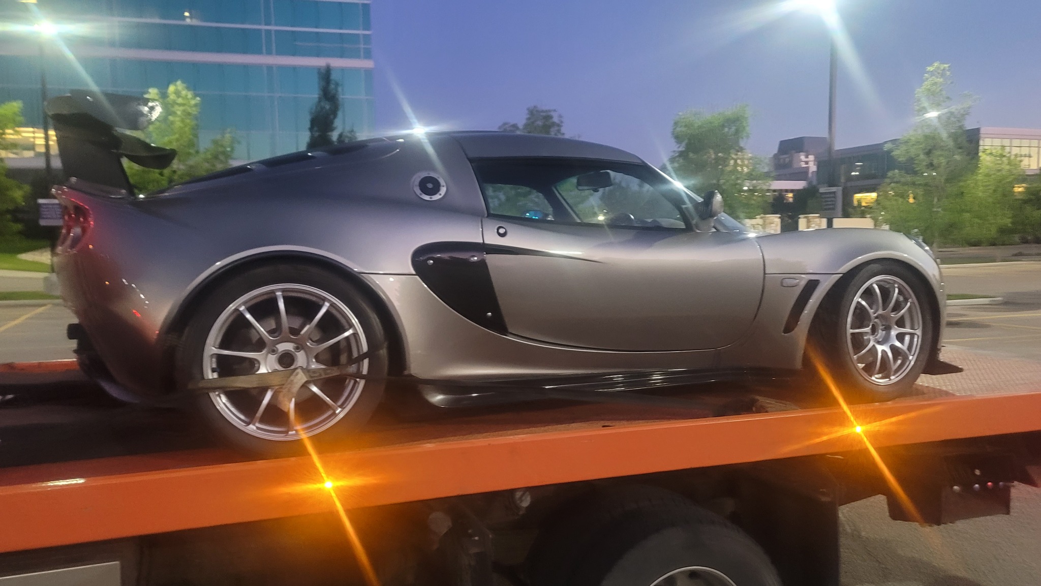Close-up of Lotus Exige secured for night transport – Calgary