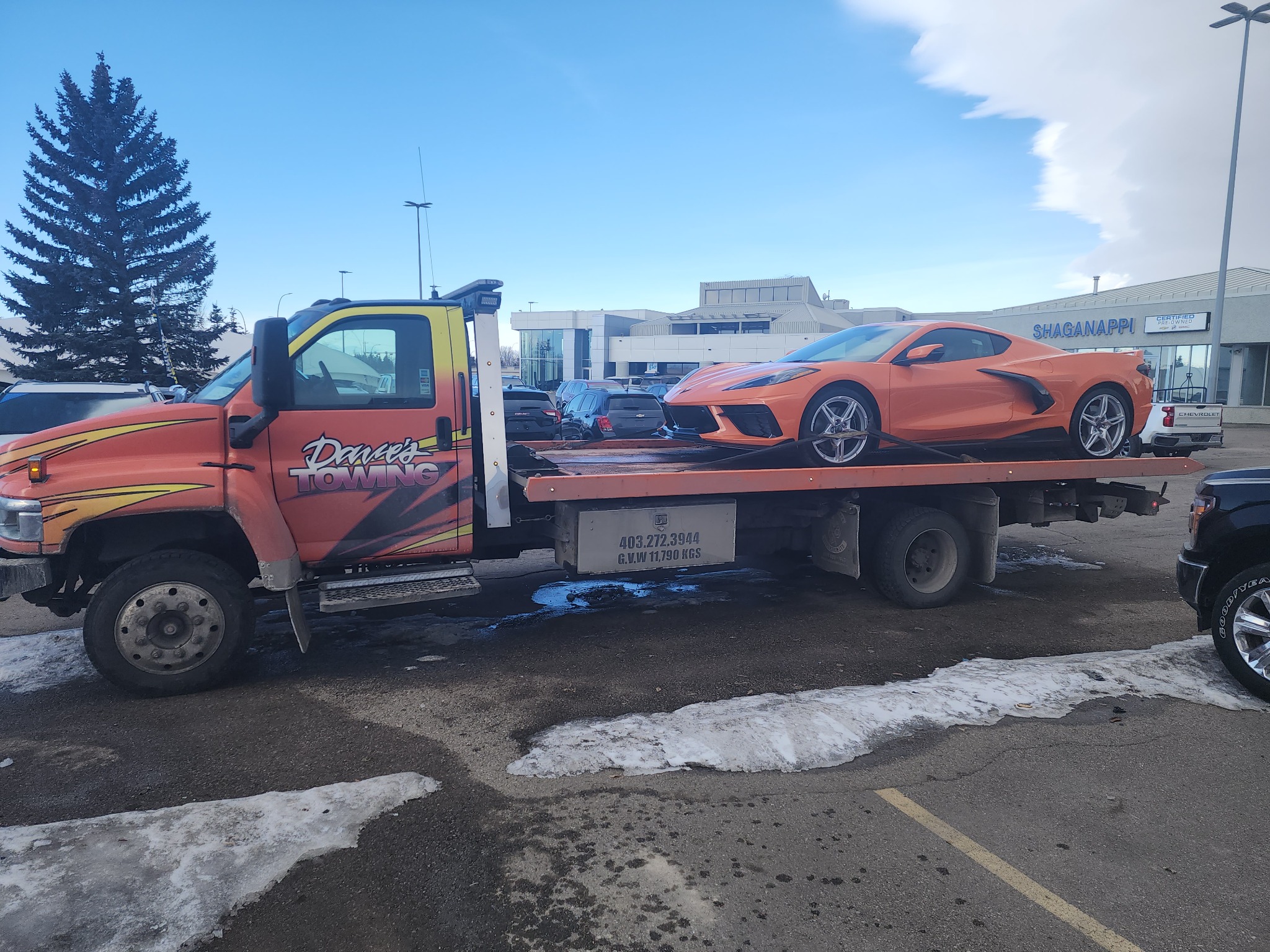 Orange C8 Corvette dealer transport – Calgary