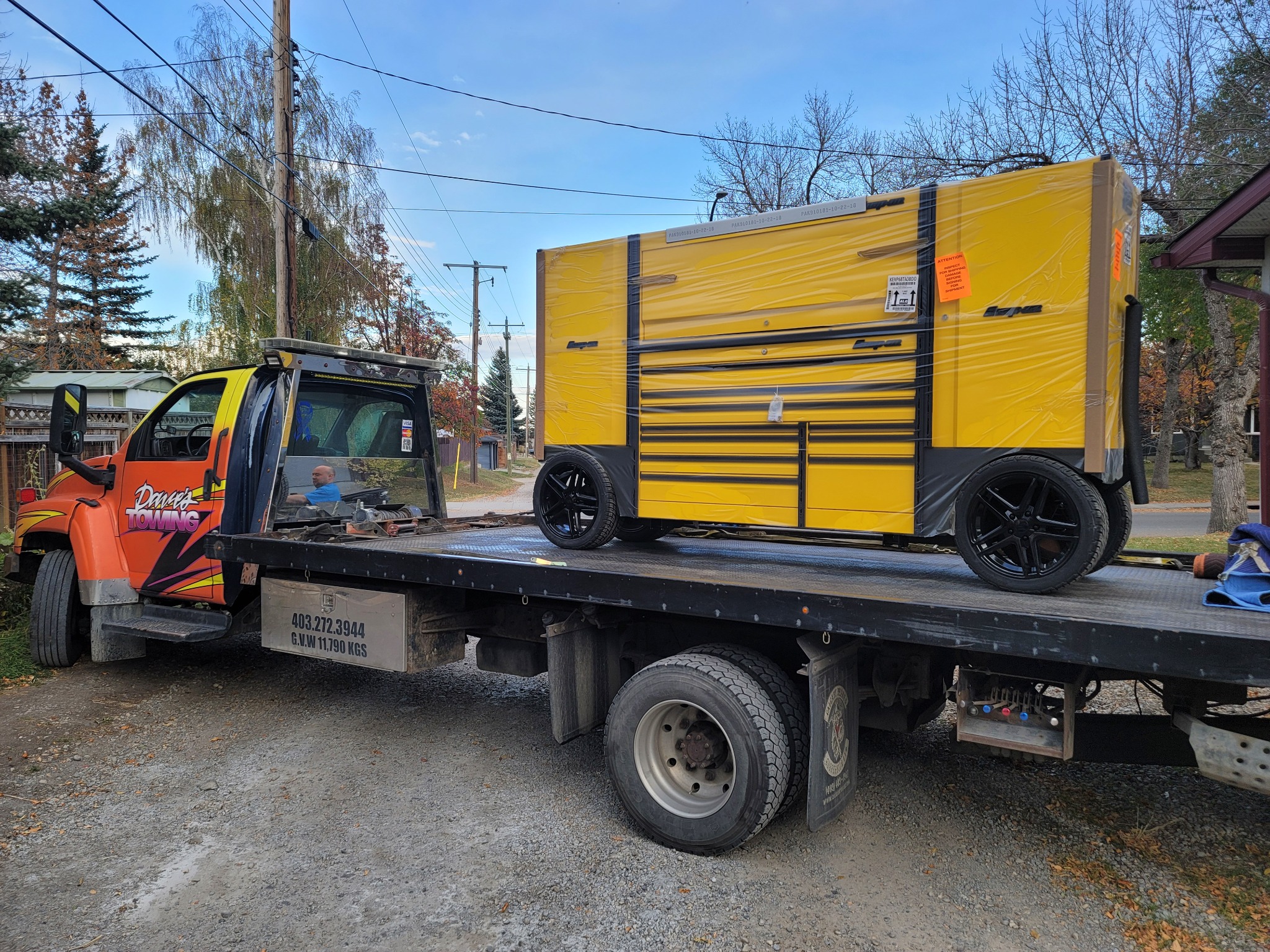 Large yellow toolbox delivery secured – Calgary