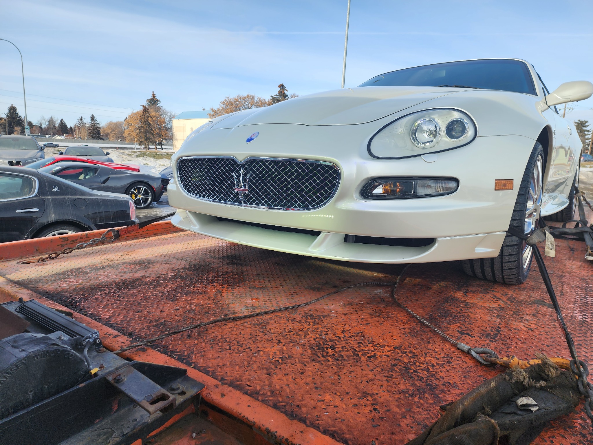 White Maserati convertible transport – Calgary (close-up)
