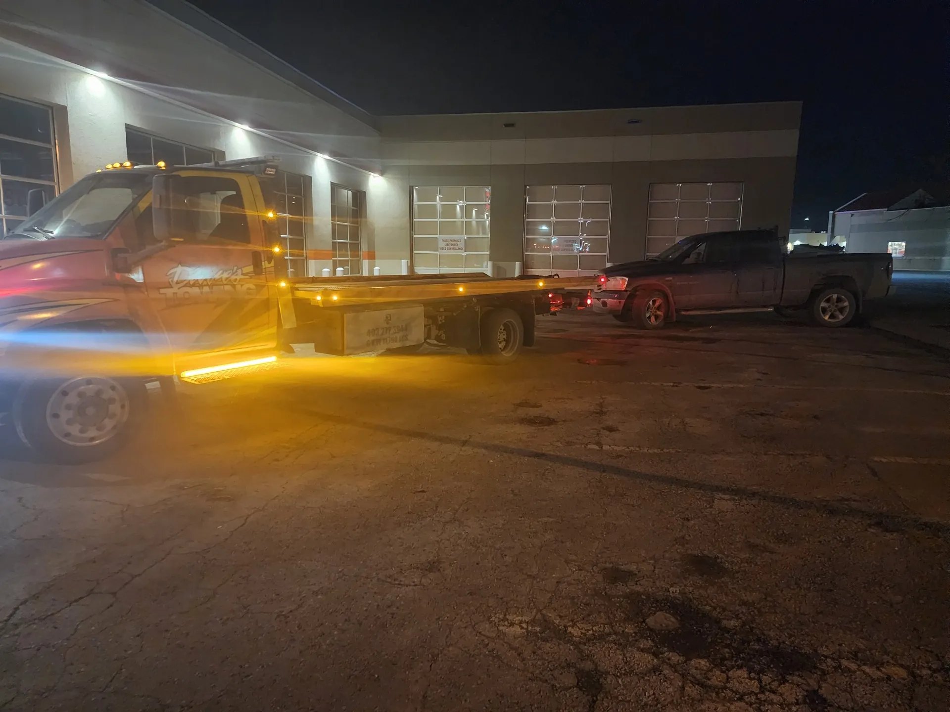 Late-night pickup truck tow by Dave's Towing in Calgary