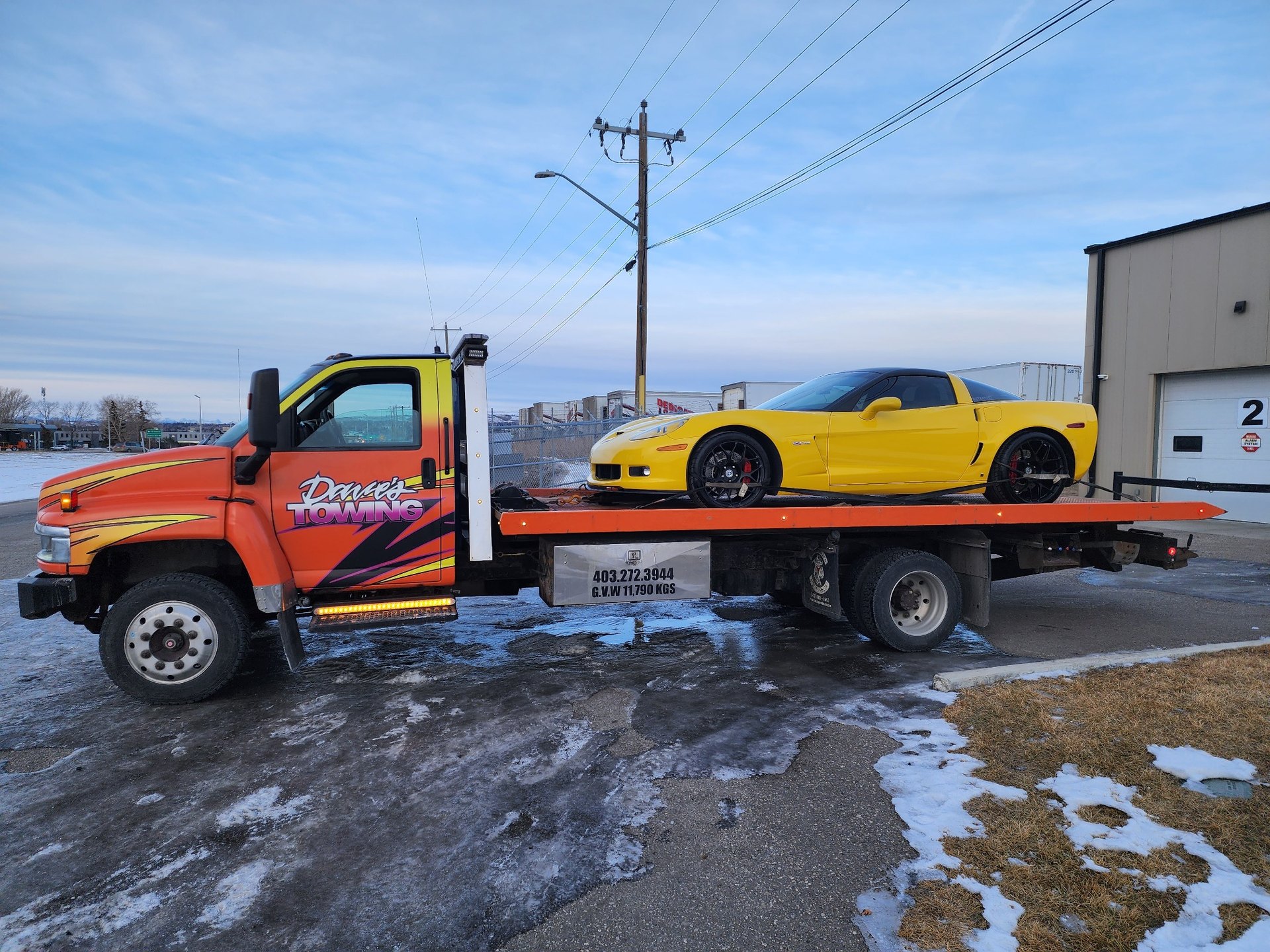 Yellow Corvette Z06 transport – Calgary (angle 1)