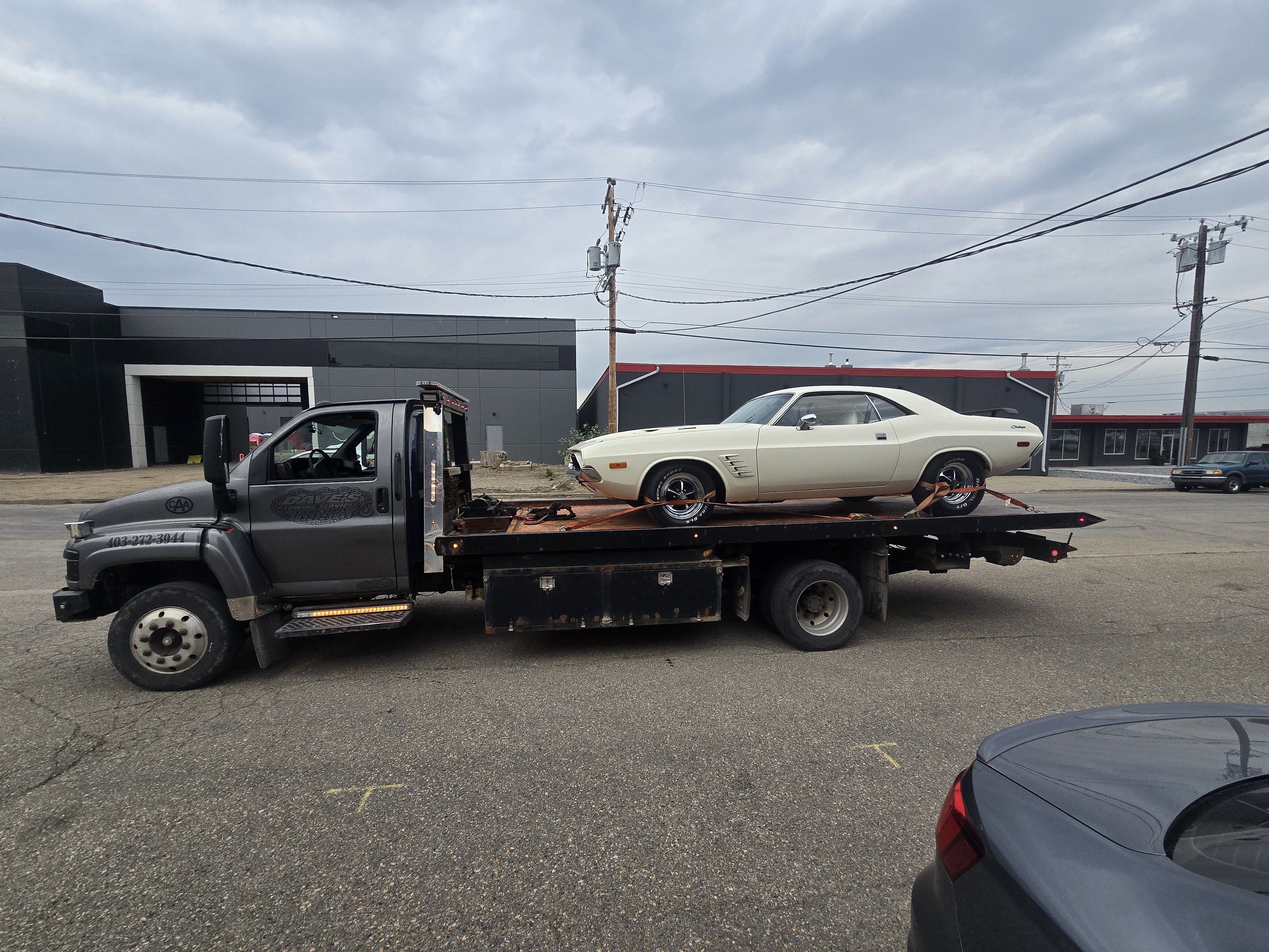 Dave's Towing: Classic Dodge Challenger Flatbed Transport in Calgary