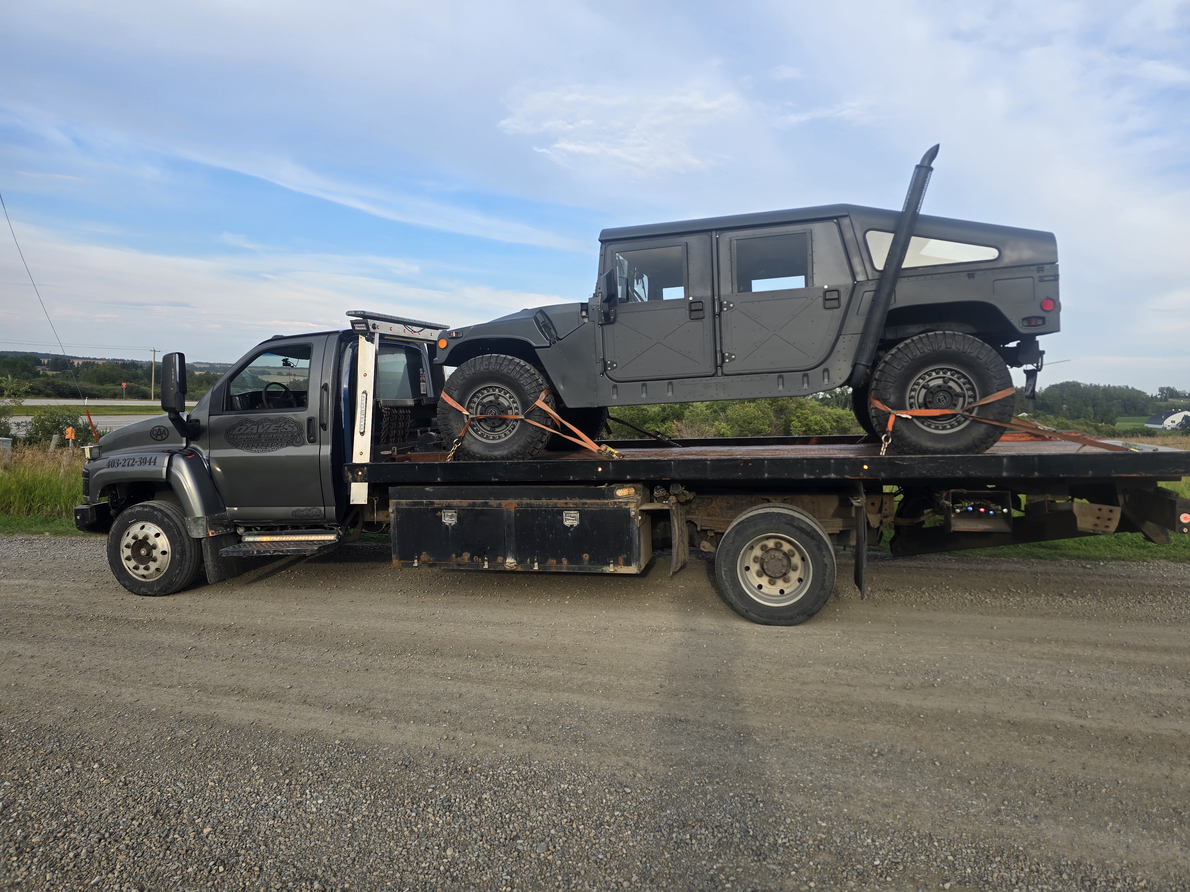 Humvee Towing - Flatbed Towing in Calgary