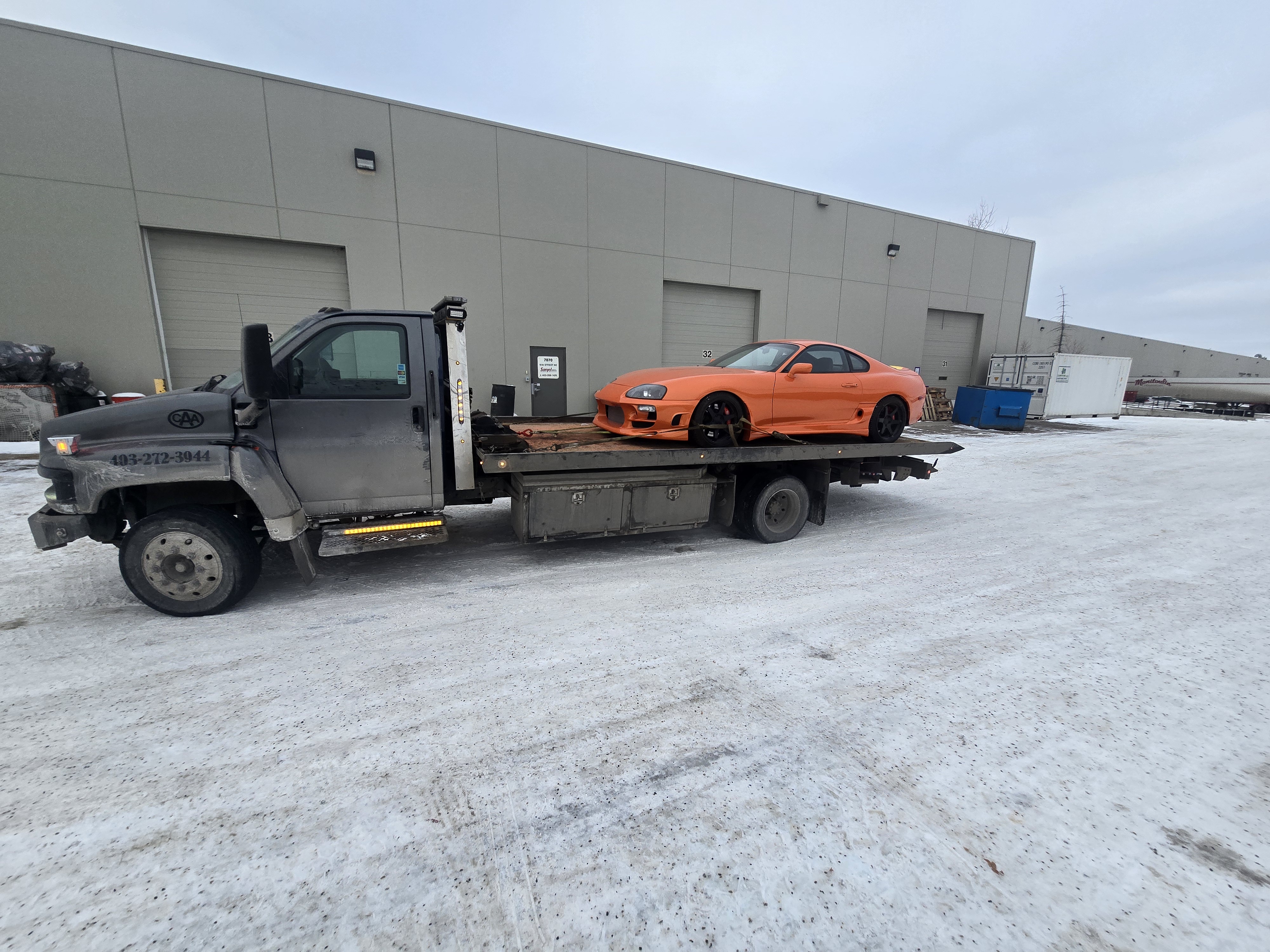 Nice little car - Flatbed Towing in Calgary
